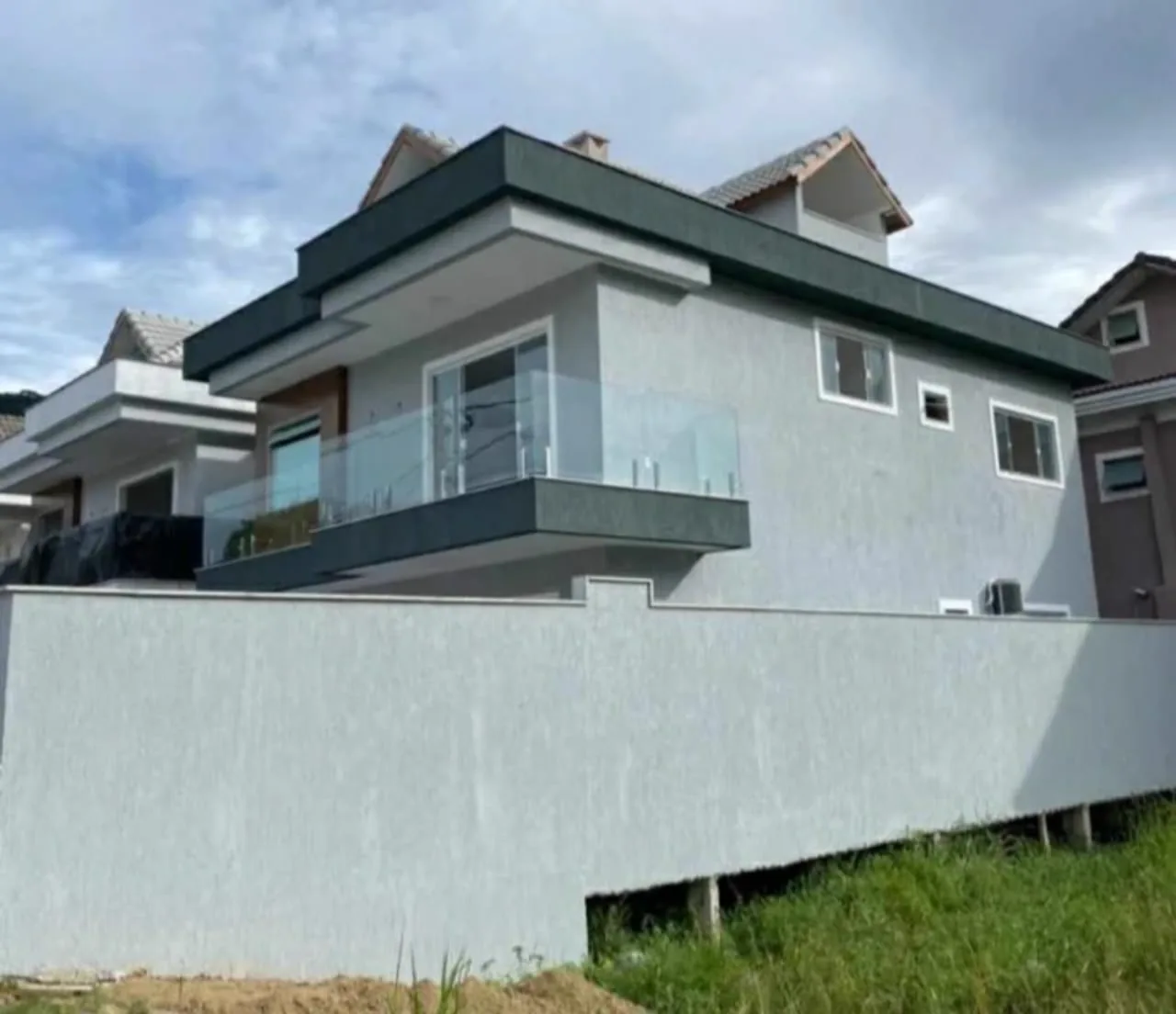 Casa construída pela Scheffel Construções, fachada finalizada
